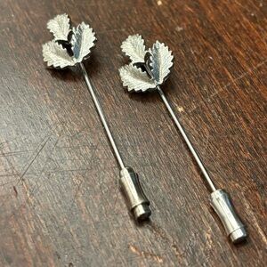 Two Vintage matching signed Monet silver tone leaf design stick lapel/hat pins
